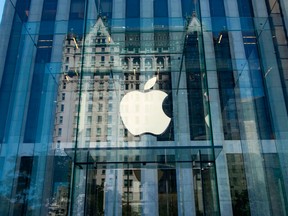 The Apple logo at the entrance to the Fifth Avenue Apple store in New York.