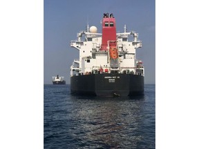 This photo provided by the United Arab Emirates' National Media Council shows the Norwegian-flagged oil tanker MT Andrea Victory off the coast of Fujairah, United Arab Emirates, Monday, May 13, 2019. Two Saudi oil tankers and a Norwegian-flagged vessel were damaged in what Gulf officials described Monday as a "sabotage" attack off the coast of the United Arab Emirates. While details of the incident remain unclear, it raised risks for shippers in a region vital to global energy supplies at a time of increasing tensions between the U.S. and Iran over its unraveling nuclear deal with world powers. (United Arab Emirates National Media Council via AP)