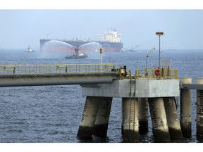 FILE - In this Sept. 21, 2016 file photo, an oil tanker approaches to the new Jetty during the launch of the new $650 million oil facility in Fujairah, United Arab Emirates. The United Arab Emirates said Sunday, May 12, 2019 that four commercial ships near Fujairah "were subjected to sabotage operations" after false reports circulated in Lebanese and Iranian media outlets saying there had been explosions at the Fujairah port.