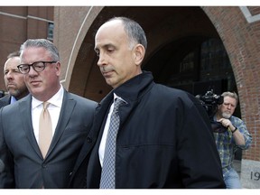 California businessman Stephen Semprevivo departs federal court Tuesday, May 7, 2019, in Boston, after pleading guilty to charges that he bribed the Georgetown tennis coach to get his son admitted to the school.