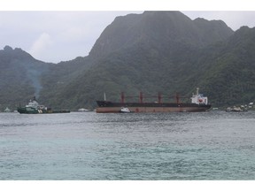 The North Korean cargo ship, Wise Honest, middle, was towed into the Port of Pago Pago in the late morning on Saturday, May 11, 2019, in Pago Pago, American Samoa. The Wise Honest ship was seized by the U.S. because of suspicion it was used to violate international sanctions. It arrived Saturday at the capital of this American territory.