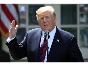 FILE - In this May 16, 2019, file photo, President Donald Trump speaks in the Rose Garden of the White House in Washington. A judge is poised to hear oral arguments Wednesday, May 22, 2019, over Trump's effort to block congressional subpoenas seeking financial records from two banks. The hearing occurs after congressional Democrats sought the information from Deutsche Bank and Capital One.