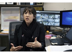 In this Monday May 13, 2019 photo Juliet Fine, principal at Beverly Hills Unified School District's K-8 Horace Mann School talks about school security during an interview in her office in Beverly Hills, Calif. Schools in Beverly Hills and others nationwide are adopting a strategy that aims to speed up the law enforcement response to shootings. Beverly Hills officials have added armed security guards, surveillance cameras and an app to report attacks and connect with police.