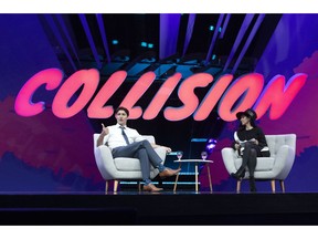 Prime Minister Justin Trudeau participates in an armchair discussion with founder and CEO of BroadbandTV Corp, Shahrfad Rafaiti, at the Collision tech conference in Toronto on Monday May 20, 2019.