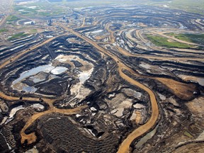 An aerial view of Canadian Natural Resources Limited (CNRL) oilsands mining operation near Fort McKay, Alta.