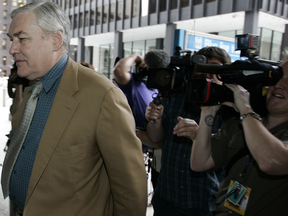Conrad Black enters the Everett McKinley Dirksen Federal Courthouse in Chicago, Illinois on July 10, 2007.