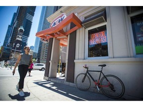 An A&W Restaurant in Toronto is photographed on Monday, July 9, 2018. A&W Revenue Royalties Income Fund increased its distributions to unitholders as it reported its first-quarter profit fell to $5.7 million, compared with $6.3 million a year ago, due to a non-cash charge.