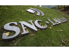 The front lawn of the headquarters of SNC Lavalin is seen Thursday, November 6, 2014 in Montreal. SNC-Lavalin Group Inc. has cancelled the sale of part of its stake in Ontario's 407 toll highway operator to the OMERS pension plan.