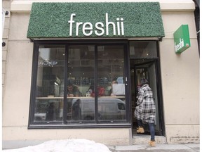 A customer walks into a Freshii restaurant in Montreal on March 21, 2017.