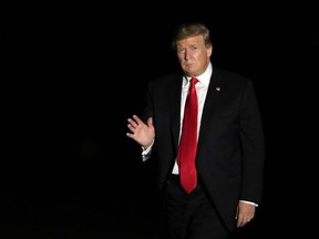 President Donald Trump waves upon arrival at the White House in Washington, from a campaign rally in Montoursville, Pa., Monday, May 20, 2019.