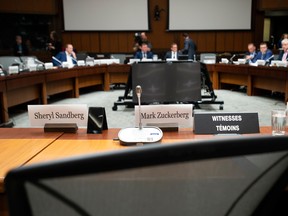 An empty chair sits behind the name tags for Facebook's Mark Zuckerberg and Sheryl Sandberg as the International Grand Committee on Big Data, Privacy and Democracy waits to begin in Ottawa, Tuesday, May 28, 2019.