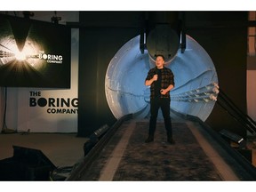 FILE - In this Dec. 18, 2018 file photo Elon Musk, co-founder and chief executive officer of Tesla Inc., speaks during an unveiling event for the Boring Co. Hawthorne test tunnel in Hawthorne, Calif. The Boring Company, backed by tech billionaire Musk has been granted a nearly $49 million contract to build a transit system using self-driving vehicles underneath the Las Vegas Convention Center.
