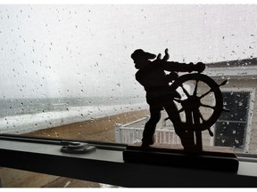 This Feb. 15, 2019 photo shows a view out the window of an oceanside condo in Salisbury, Mass. Academic researchers say concerns over rising sea levels and increased flooding are having subtle but significant impacts on coastal property values, finding that climate change concerns have sapped more than $15 billion in appreciation from homes along the Eastern Seaboard and Gulf Coast.