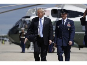 President Donald Trump walks to board Air Force One for a trip to Louisiana to deliver remarks on energy infrastructure, Tuesday, May 14, 2019, in Andrews Air Force Base, Md.