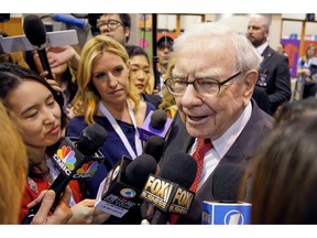 Warren Buffett, Chairman and CEO of Berkshire Hathaway, speaks to reporters during a tour of the CHI Health convention center where various Berkshire Hathaway companies display their products, before presiding over the annual shareholders meeting in Omaha, Neb., Saturday, May 4, 2019. An estimated 40,000 people are expected in town for the event, where Buffett and his Vice Chairman Charlie Munger will preside over the meeting and spend hours answering questions.