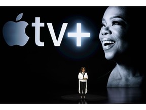 FILE - In this March 25, 2019, file photo Oprah Winfrey speaks at the Steve Jobs Theater during an event to announce new Apple products in Cupertino, Calif. Apple users will be able to subscribe to HBO, Showtime and a handful of other channels directly through Apple's new TV app, bypassing the need to download or launch a separate app. The new capabilities available Monday, May 13, come ahead of Apple's plan to offer its own original shows, including ones from Oprah Winfrey and Steven Spielberg.