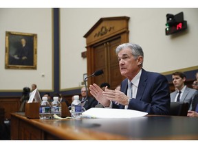 FILE- In this Feb. 27, 2019, file photo Federal Reserve Board Chair Jerome Powell gestures while speaking before the House Committee on Financial Services hearing on Capitol Hill in Washington. On Wednesday, May 1, the Federal Reserve releases its latest monetary policy statement after a two-day meeting.