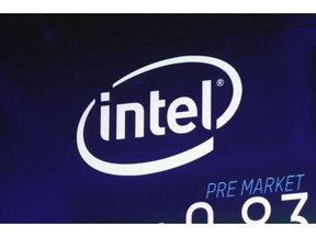 FILE - In this Oct. 3, 2018, file photo the Intel logo appears on a screen at the Nasdaq MarketSite, in New York's Times Square. Intel has revealed another hardware security flaw that could affects millions of machines around the world. The chipmaker said Tuesday, May 14, 2019, that there's no evidence of bad actors exploiting the bug, which is embedded in the architecture of computer hardware.