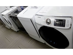 FILE - In this May 9, 2019, file photo washers and dryers are shown on display in a retail store in Cranberry Township, Pa. On Friday, May 24, the Commerce Department releases its March report on durable goods.
