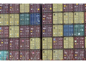 FILE - In this July, 5, 2018 photo, a bay of 40-foot shipping container fill the stern of a container ship at the Port of Savannah in Savannah, Ga. President Donald Trump turned up the pressure on China Sunday, May 5, 2019, threatening to hike tariffs on $200 billion worth of Chinese goods.