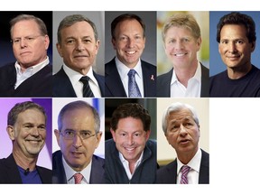 This photo combination shows the highest-paid CEOs at big U.S. companies for 2018, as calculated by The Associated Press and Equilar, an executive data firm. Top row, from left: David Zaslav, Discovery, $129.5 million; Robert Iger, Walt Disney, $65.6 million; Stephen MacMillan, Hologic, $42 million; Joseph Hogan, Align Technology, $41.8 million; and Daniel Schulman, PayPal, $37.8 million. Bottom row, from left: Reed Hastings, Netflix, $36.1 million; Brian Roberts, Comcast, $35 million; Robert Kotick, Activision Blizzard, $30.8 million; and James Dimon, JPMorgan Chase, $30 million. The third-highest paid CEO, Richard Handler of Jefferies Financial Group, is not pictured. Handler made $44.7 million. (AP Photo)