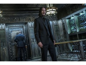 This image released by Lionsgate shows Keanu Reeves in a scene from "John Wick: Chapter 3 - Parabellum." The third installment of the hyper violent Keanu Reeves franchise has taken the top spot at the North American box office and ending the three-week reign of "Avengers: Endgame." Studios on Sunday, May 19, 2019, say "John Wick: Chapter 3 - Parabellum" has grossed an estimated $57 million in its opening weekend.