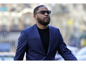 FILE - In this March 5, 2019, file photo, Christian Dawkins arrives at federal court in New York. A jury began deliberating on Monday, May 6, 2019, at the trial of Dawkins, a business manager, and youth basketball coach Merl Code, both accused of secretly bribing assistant college basketball coaches.