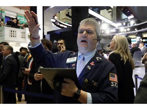 FILE - In this April 11, 2019, file photo trader John Panin works on the floor of the New York Stock Exchange. The U.S. stock market opens at 9:30 a.m. EDT on Tuesday, May 7.