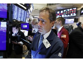 FILE - In this May 23, 2019, file photo trader Dudley Devine works on the floor of the New York Stock Exchange. The U.S. stock market opens at 9:30 a.m. EDT on Thursday, May 30.