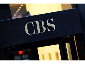 FILE - This Thursday, Dec. 6, 2018, file photo shows the CBS logo at the entrance to its headquarters, in New York. CBS is unveiling its fall 2019 prime-time schedule on Wednesday, May 15, 2019, and will host a presentation to advertisers with some of its top talent describing their newest shows.