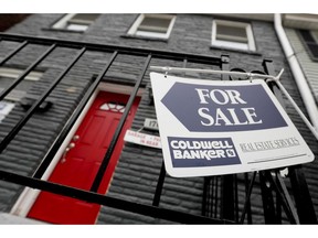 FILE - This Jan. 4, 2019, file photo shows a house for sale in Pittsburgh's Lawrenceville neighborhood. Homebuyers in some of the biggest U.S. cities are seeing a pickup in the number of homes for sale, especially in the most affordable segment of the market.