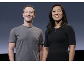 FILE- In this Sept. 20, 2016, file photo, Facebook CEO Mark Zuckerberg and his wife, Priscilla Chan, smile as they prepare for a speech in San Francisco. Liam Booth, the security chief of Zuckerberg and his family, has been accused of sexual misconduct and making racist and homophobic comments about members of his staff and about Zuckerberg's wife, Chan.