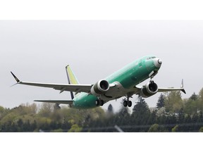 FILE - In this Wednesday, April 10, 2019 file photo, a Boeing 737 Max 8 airplane being built for India-based Jet Airways, takes off on a test flight at Boeing Field in Seattle. Boeing said Sunday, May 5, 2019, that it discovered after airlines had been flying its 737 Max plane for several months that a safety alert in the cockpit was not working as intended, yet it didn't disclose that fact to airlines or federal regulators until after one of the planes crashed.