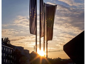 European flags blow in front of the European Central Bank as the sun rises in Frankfurt, Germany, Sunday, May 26, 2019.