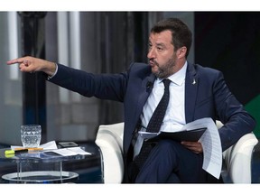 In this photo taken on Wednesday, May 22, 2019, Italian Deputy Premier and Interior Minister, Matteo Salvini, gestures as he takes part in a RAI State TV show in Rome. Dutch and British voters were the first to have their say Thursday in elections for the European Parliament, starting four days of voting across the 28-nation bloc that pits supporters of deeper integration against populist euroskeptics who want more power for their national governments.