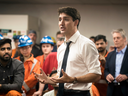 Prime Minister Justin Trudeau speaks with employees at Stelco in Hamilton, Ont., May 17, 2019.