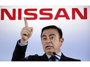 FILE - In this May 11, 2012, file photo, then Nissan Motor Co. President and CEO Carlos Ghosn speak during a press conference in Yokohama, near Tokyo. Nissan is seeing sales and profits tumble, as its once revered former chairman, Carlos Ghosn, awaits trial on charges of financial misconduct. The Japanese automaker says it is beefing up corporate governance and sticking with its alliance with French partner Renault SA.