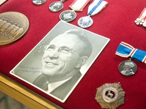 Medals belonging to former federal NDP leader Tommy Douglas and his wife, including a signed photograph of the politician.