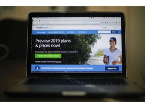 FILE - In this Oct. 31, 2018, file photo, the HealthCare.gov website is photographed in Washington. The Trump administration is arguing in court that the entire Affordable Care Act should be struck down as unconstitutional. But at the same time Justice Department lawyers have suggested that federal judges could salvage an important part _ its anti-fraud provisions.