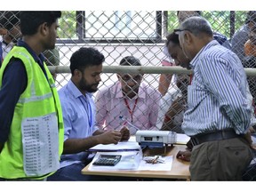 Election officials begin counting votes of India's massive general elections, in New Delhi, India, Thursday, May 23, 2019. The count is expected to conclude by the evening, with strong trends visible by midday.