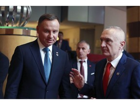 Poland's President Andrzej Duda speaks with his Albanian counterpart Ilir Meta, right, during the Brdo-Brijuni Process Leaders' Meeting in Tirana, Albania, on Thursday, May 9, 2019. The Brdo-Brijuni Process is an initiative created by Croatia and Slovenia in 2013 to push forward the regional accession into EU.