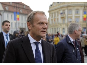 European Council President Donald Tusk walks in Piata Mare square in the Transylvanian town of Sibiu, Romania, Wednesday, May 8, 2019. European Union leaders hold an EU summit in Sibiu on Thursday to start setting out a course for increased political cooperation in the wake of the impending departure of the United Kingdom from the bloc.