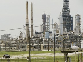 Exxon and Sabic will build a petrochemical plant to convert Permian Basin oil. Here, an Exxon refinery in Baytown, Tex.