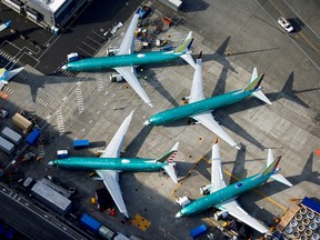 An aerial photo shows Boeing 737 MAX airplanes parked on the tarmac at the Boeing Factory in Renton, Wash.