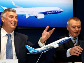 Boeing Commercial Airplanes CEO Kevin McAllister and International Airlines Group CEO Willie Walsh attend the Boeing 737 MAX 8 commercial announcement.