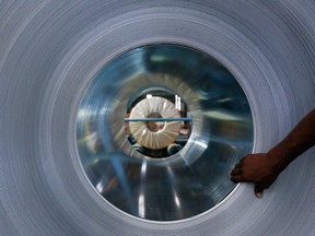 A coil of galvanized steel at the manufacturing facility of Uttam Galva Steels Ltd. in Khopoli, Maharashtra, India.