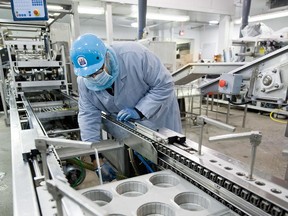 A Maple Leaf Foods processing facility. The Conference Board of Canada said that by 2025 all labour force growth in Canada would be driven by new immigrants.