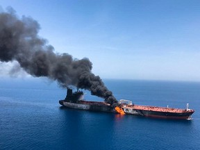 An oil tanker is seen after it was attacked at the Gulf of Oman, in waters between Gulf Arab states and Iran, June 13, 2019.