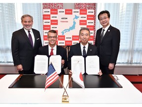 The signing of the collaboration agreement. From left to right: Dan Brouillette, Deputy Secretary, U.S. Department of Energy; Mark Whitney, Executive Vice President and General Manager for AECOM's Nuclear & Environment strategic business unit; Goro Yanase, Chief Nuclear Officer, Toshiba ESS; and Taizo Takahashi, Commissioner, Agency for Natural Resources and Energy (ANRE).
