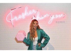 Chrissy Teigen poses at the FOREO booth at the POPSUGAR Play/Ground.